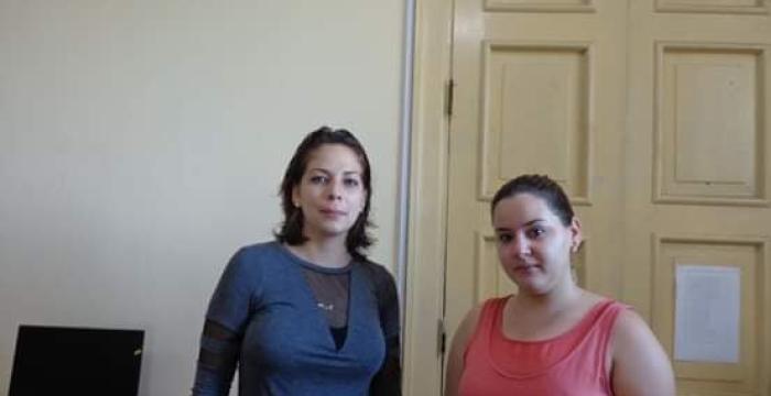 Tribunal de Villa Clara, sede del acto provincial por el Día del trabajador jurídico-2 Las estudiantes de Derecho Yisel Egües González y Annis Gloria Torres Martínez continúan colaborando con las salas de justicia a pesar de la presencia del nuevo coronavirus. Foto: Cortesía del Tribunal Provincial Popular de Villa Clara